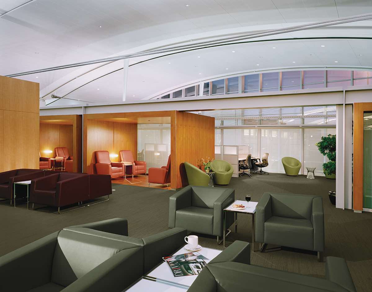 Various seating areas in the Toronto International Maple Leaf Lounge.