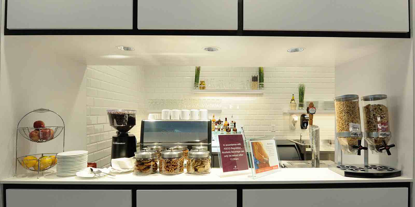 Self-serve food area in the Plaza Premium Lounge in Toronto Pearson Terminal 1 international departures.