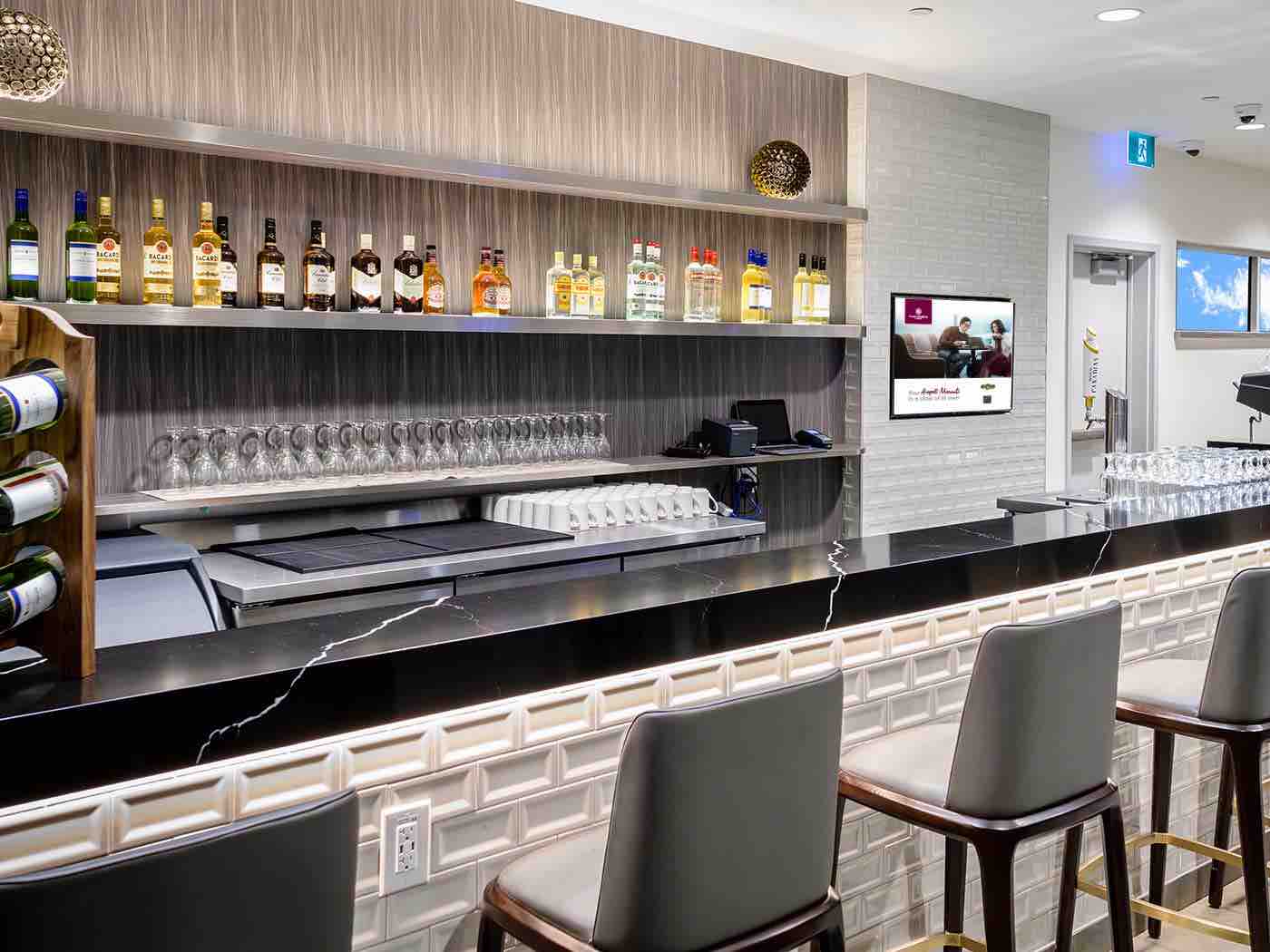 The bar area in the Plaza Premium Lounge Toronto Terminal 1 Transborder.