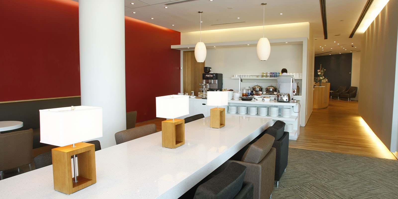 An area to eat and lounge in the Domestic Plaza Premium Lounge in Toronto Pearson Terminal 3.